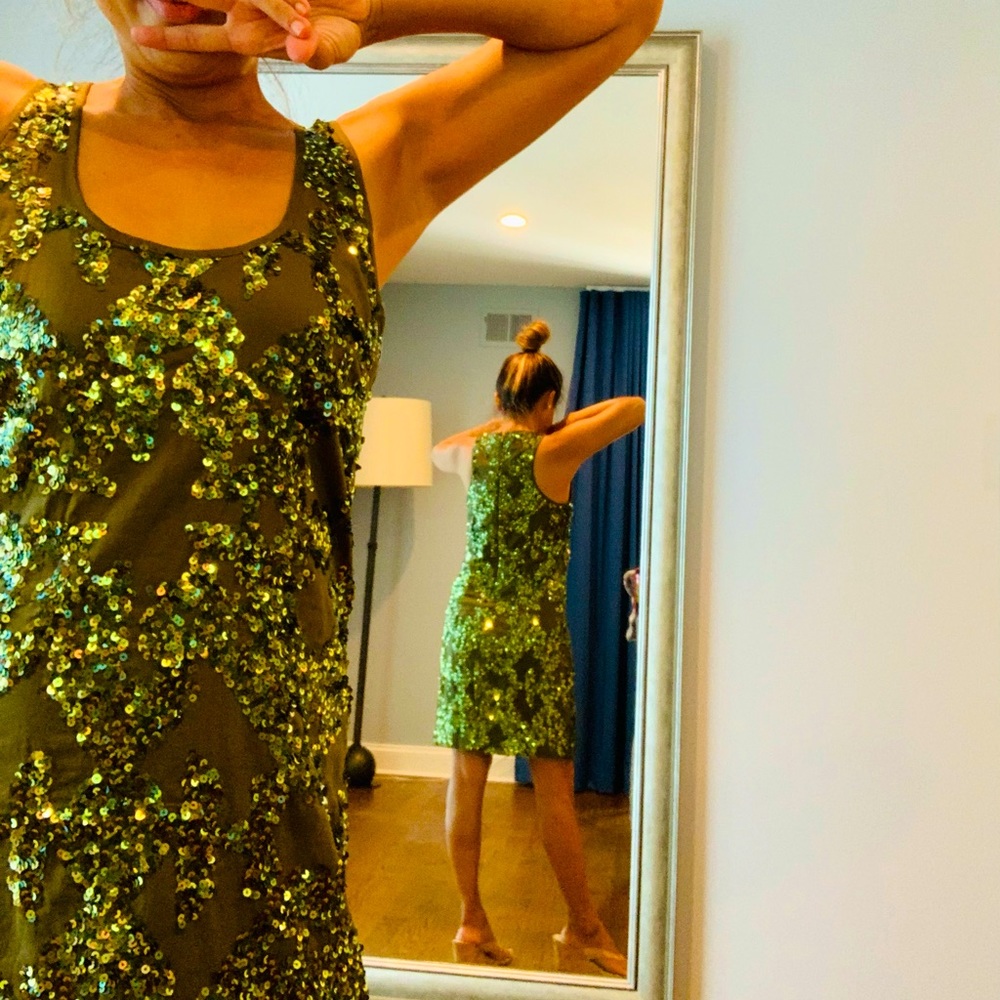 Olive green mini sequins sheath dress. Scoopneck